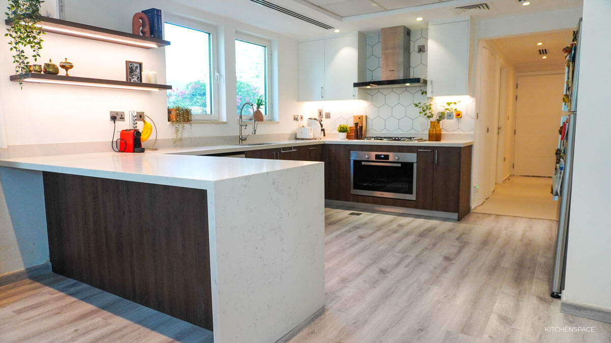 Walnut Kitchen with Geometric Backsplash